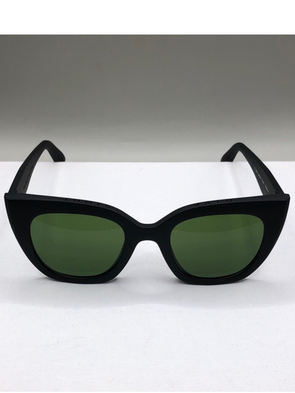 Toms Black Frame Sunglasses with Green Lenses